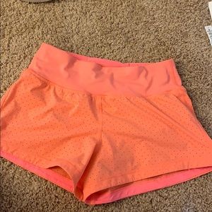 Orange lululemon shorts